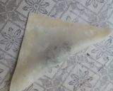 A picture of step 4 of Chicken Wontons.