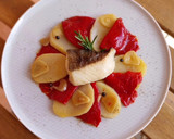 Foto del paso 6 de la receta: Bacalao al romero al horno con piquillos y patatas confitadas