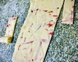Foto del paso 3 de la receta: Cuernitos de mortadela y ajo
