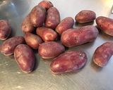 Une image de l'étape 1 de Pommes de terre gratinées au pecorino,ail et persil.
