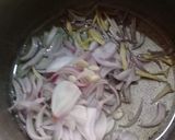 A picture of step 1 of Baingan Qeema.