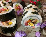 A picture of step 9 of Mickey Mouse Roll Sushi.
