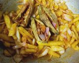 A picture of step 6 of Onion Stuffed Karela.