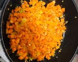 A picture of step 1 of Carrot and Brown Lentil Soup with Ground Egusi and Bherebhere Spice.