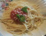 A picture of step 5 of Spaghetti with tomato sauce and cheddar cheese 😍.