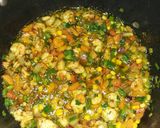 A picture of step 10 of Fried rice plantains and fried chicken.