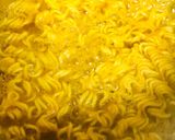 A picture of step 3 of A magical treat with Maggi and peri peri potato fries.