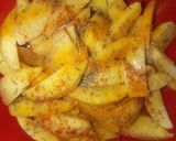 A picture of step 2 of Baked Potatoes wedges.