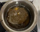 A picture of step 2 of Jaggery Tea.