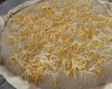 Foto del paso 3 de la receta: Hojaldre de cebolla, panceta y huevo duro