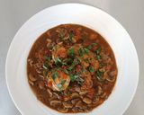 A picture of step 11 of Chicken sauté chasseur.