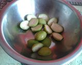 A picture of step 2 of Amra/hog plum ki chutney.