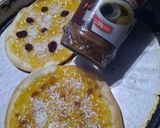 Foto del paso 5 de la receta: Galletones con mermelada y coco con discos de empanadas
