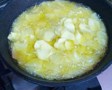 Foto del paso 6 de la receta: Tortilla de patatas con pulpo, cebolla y pimiento verde
