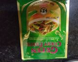 A picture of step 2 of Vegetable sukha in green curry paste.