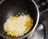 A picture of step 1 of Dessicated coconut rice.
