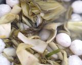 Hình bước làm 3 của món Canh dưa chua chả cá basa viên