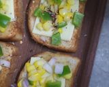 A picture of step 4 of Corn 🌽 Capsicum 🫑 Cheesy Toast.