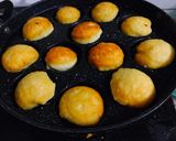 A picture of step 3 of Dahi vada in Appe pan.