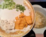 Foto langkah ke 4 dari resep Bubur Labu Kuning (MPASI Bayi 8 Bln +).