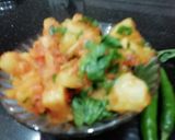 A picture of step 6 of Tamatari aaloo.