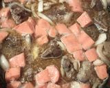 A picture of step 8 of Goat and Onions.