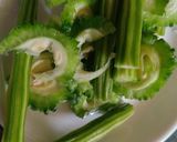 A picture of step 1 of Bitter gourd dal.