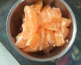 A picture of step 2 of Orange refreshing juice.