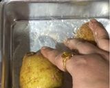 A picture of step 2 of Double Baked Potato-Egg Jackets.