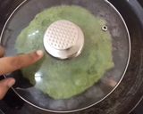 A picture of step 2 of Stuff whole green moong chila.