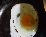 A picture of step 1 of 3 spice Half fry Egg.