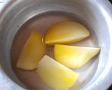 A picture of step 1 of Bitter Gourd Green Mango Curry.