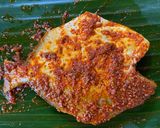 A picture of step 4 of Meen Pollichathu - Kerala special.