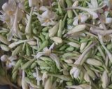 Foto langkah ke 1 dari resep Tumis bunga pepaya.
