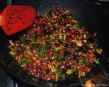 A picture of step 4 of Persian Pomegranate Rice with Pistachio and Raisins.