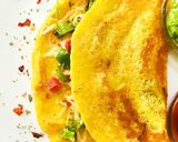 A picture of step 3 of Moong dal veggie chilla.