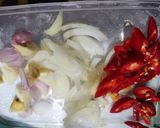 Foto langkah ke 1 dari resep Oseng Cumi Cabe Bawang.