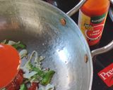 A picture of step 2 of Mix schezwan dhokla rice.