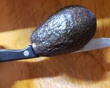 A picture of step 1 of Breakfast Avocado.