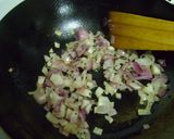 A picture of step 2 of Achari Baingan Ki Kadhi.