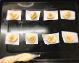 A picture of step 3 of Parmesan chilli duchess potatoes swirl with red pepper sauce.