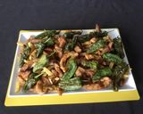 Foto del paso 13 de la receta Secreto ibérico de papada con patatas y pimientos del padrón