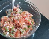 A picture of step 2 of Cheese nachos with salsa and guacamole.