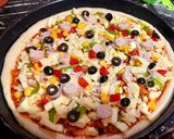 A picture of step 7 of 🍕Cheesy Smokey tikka pizza🍕.