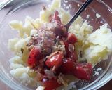 A picture of step 3 of Sig's Tomato and potato mash filled potato boats.