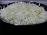 Coca con cebolla caramelizada y sobrasada