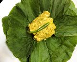 A picture of step 3 of Lau Patay Kacha Kolar Paturi (Raw Banana steam cooked in Bottle Gourd Leaves - Bong style).