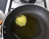 A picture of step 2 of Raw turmeric pickle.