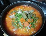 Foto del paso 7 de la receta: Guiso de contramuslo de pollo con menestra y papas fritas