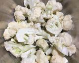 A picture of step 1 of Gobhi Matar Curry.